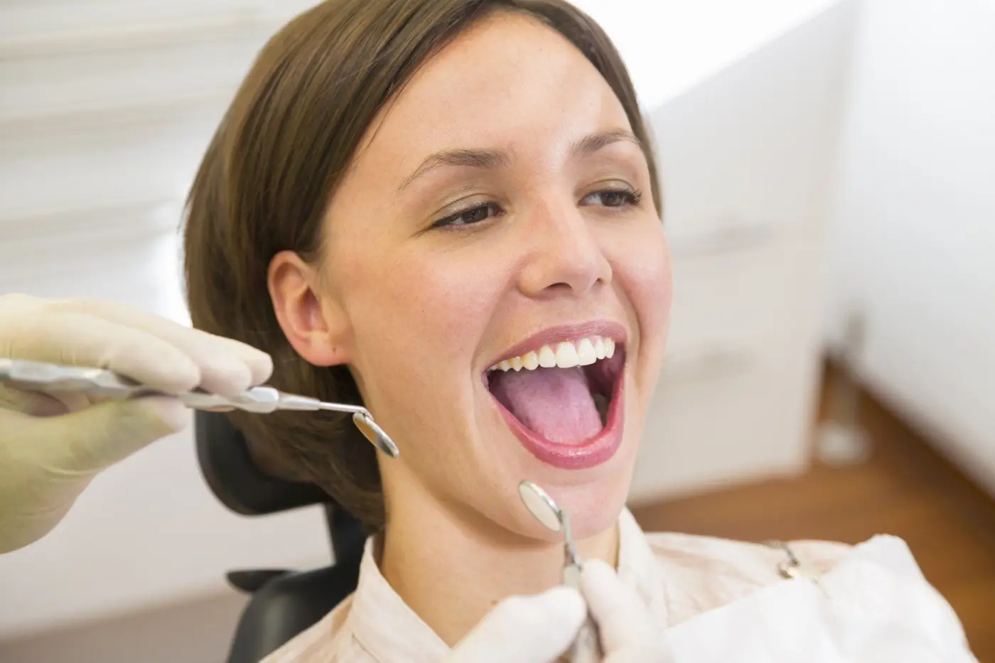 Patient smiling during a check-up