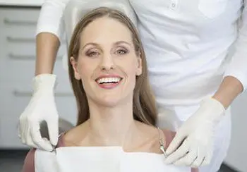 Patient smiling during a hygiene appointment
